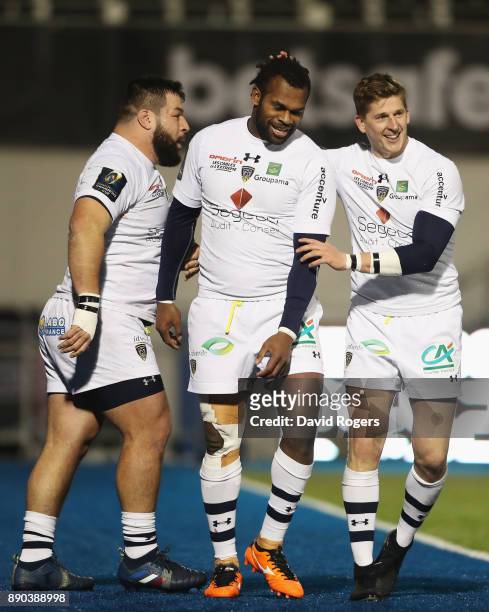 Alivereti Raka of Clermont Auvergne celebrates scoring his third try and the team's third try with David Strettle during the European Rugby Champions...