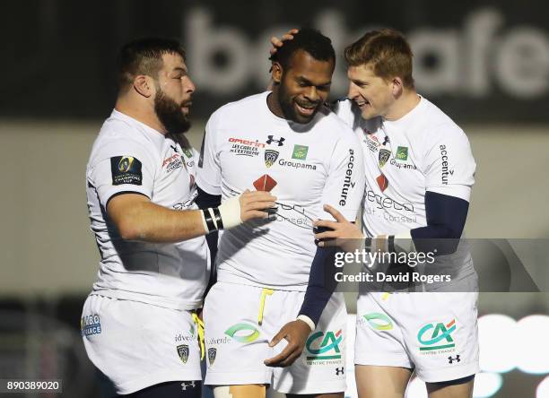 Alivereti Raka of Clermont Auvergne celebrates scoring his third try and the team's third try with David Strettle during the European Rugby Champions...