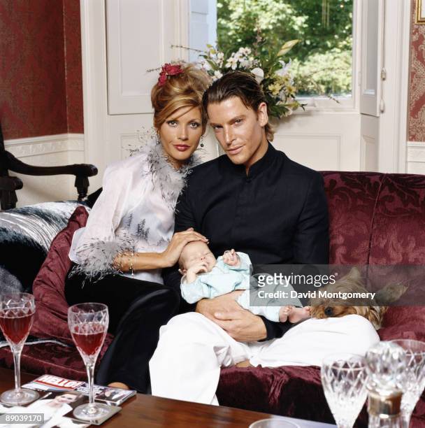 English pop singer and model Mandy Smith with her fiance, fashion model Ian Mosby, and their son, Max Harrison Mosby, 2001.