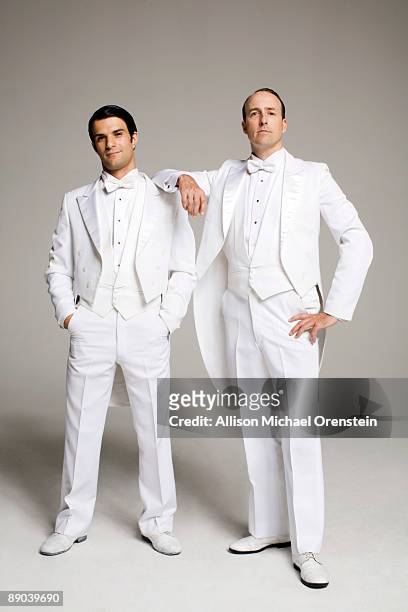 two men in white tuxedos standing - dinner jacket stock pictures, royalty-free photos & images