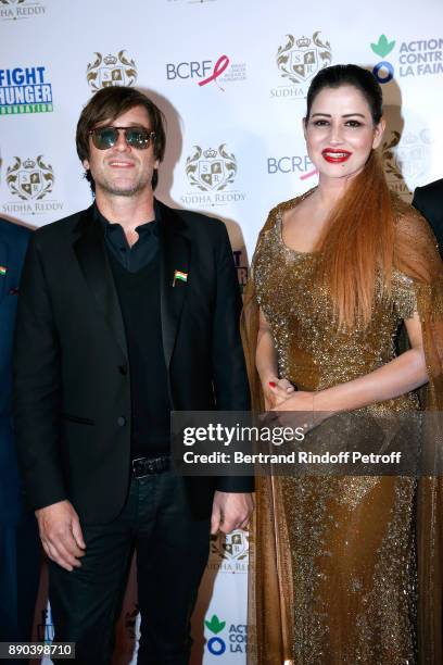 Support of "Action Contre La Faim", singer Thomas Dutronc and Indian millionaire Sudha Reddy attend Sudha Reddy gives 135000 Euros to the "Action...