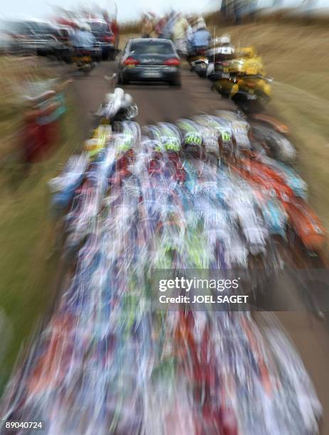 The pack rides on July 15, 2009 in the 192 km and eleventh stage of the 2009 Tour de France cycling race run between Vatan and Saint-Fargeau. US...