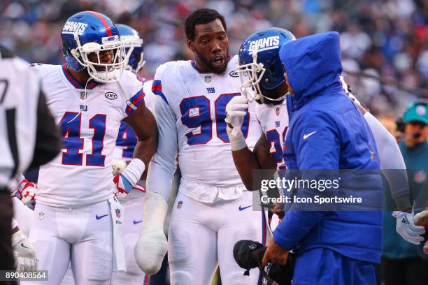 New York Giants cornerback Dominique Rodgers-Cromartie and New York Giants defensive end Jason Pierre-Paul check on teammate New York Giants strong...