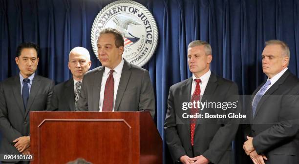 Acting U.S. Attorney William D. Weinreb speaks at the podium during a press conference about the indictment of former Massachusetts State Senator...