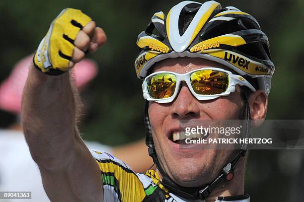 Cycling Team Columbia-High Road 's leader Mark Cavendish of Great Britain jubilates on the finish line after winning on July 15, 2009 the 192 km and...