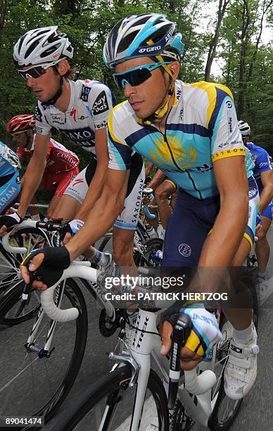 Tour de France winner and Kazakh cycling team Astana 's leader Alberto Contador of Spain rides with Danish cycling team Team Saxo Bank 's leader Andy...