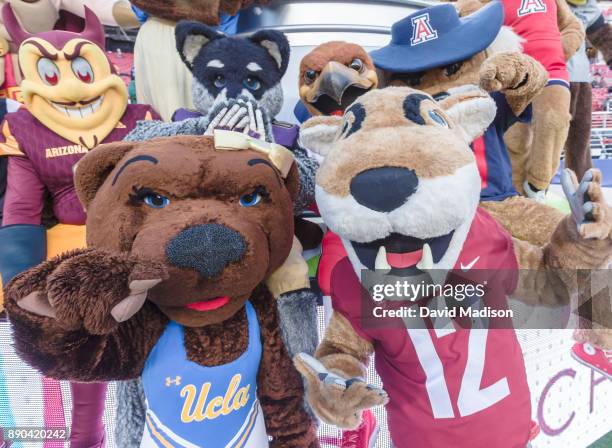 Mascots of the Pac-12 Conference including Josephine Bruin and Butch T. Cougar ; Sparky the Sun Devil , Harry the Husky , Swoop , and Wilbur T....