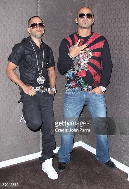 Wisin Y Yandel attend a press conference at Gansevoort South on July 15, 2009 in Miami Beach, Florida.