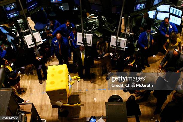 Cartoon character Spongebob Squarepants arrives on the trading floor to ring the closing bell at the New York Stock Exchange on July 15, 2009 in New...