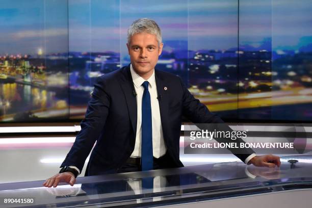 Newly elected president of Les Republicains right-wing party, Laurent Wauquiez looks on before appearing on Le Journal de 20h program on TF1...