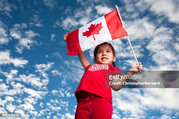 girl celebrating canada day - canada day people stock pictures, royalty-free photos & images