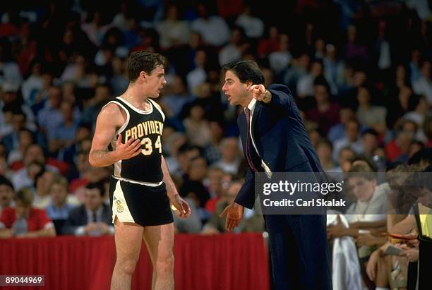 Playoffs: Providence coach Rick Pitino with Billy Donovan on sidelines during game vs Georgetown. Louisville, KY 3/21/1987 CREDIT: Carl Skalak