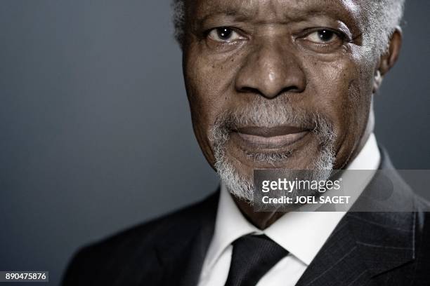 Former United Nations secretary-general Kofi Annan poses during a photo session in Paris on December 11, 2017.