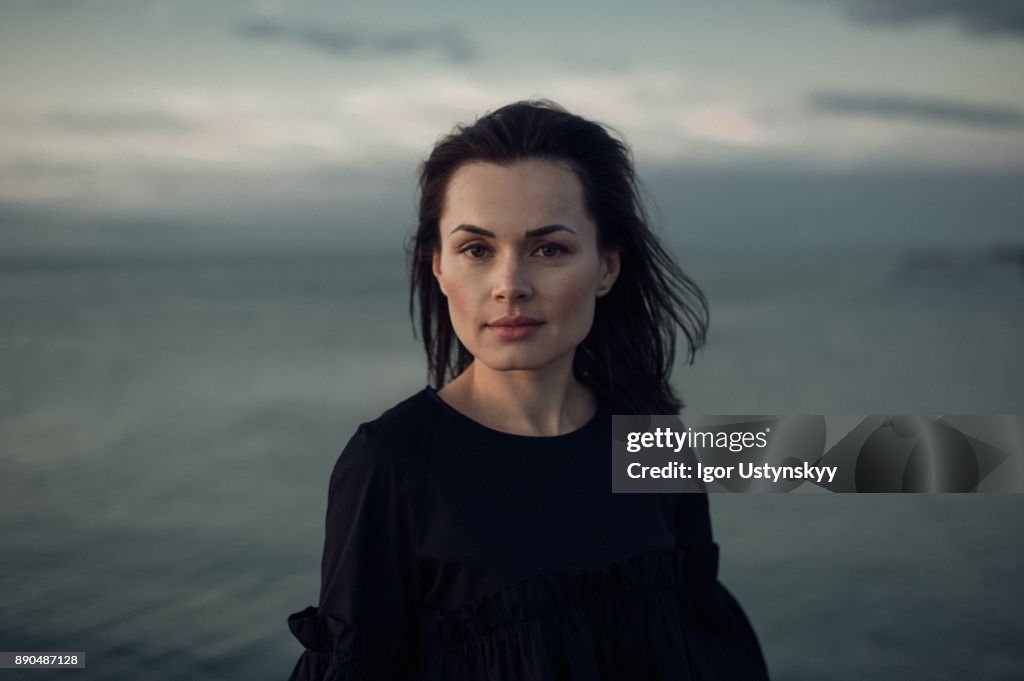 Tired woman walking near the sea