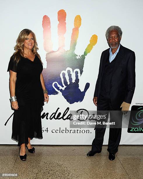 Lori McCreary and actor Morgan Freeman attend the Mandela Day Gala Dinner hosted by 46664 and the Nelson Mandela Foundation at Grand Central Terminal...