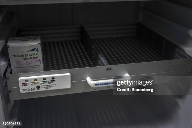 Box of Paclitaxel chemotherapy medicine sits on an empty shelf in the Oncology Unit of the Luis Razetti University Hospital in Barcelona, Venezuela,...
