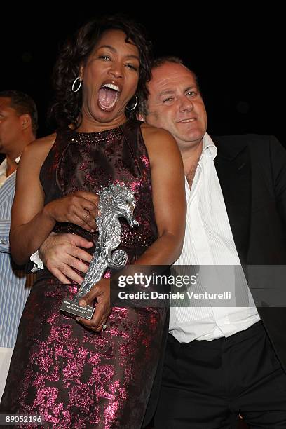 Angela Bassett and Pascal Vicedomini attend day four of the Ischia Global Film And Music Festival on July 15, 2009 in Ischia, Italy.