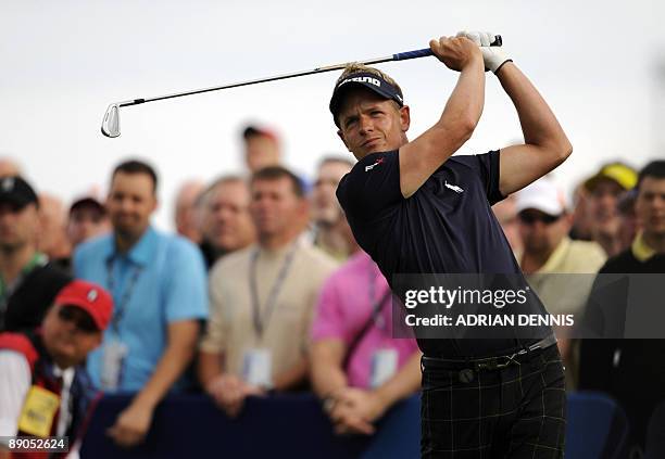English golfer Luke Donald tees off from the 1st tee on the first day of the 138th British Open Championship at Turnberry Golf Course in south west...