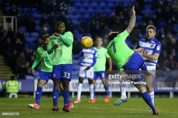 Lee Tomlin of Cardiff scores his sides second goal during the Sky Bet Championship match between Reading and Cardiff City at Madejski Stadium on...