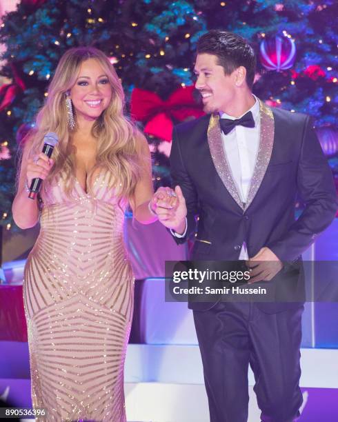 Mariah Carey and Bryan Tanaka live on stage at The O2 Arena on December 11, 2017 in London, England.