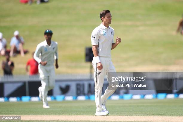 Trent Boult of New Zealand celebrates his 200th test wicket as he dismisses Kraigg Brathwaite of the West Indies during day four of the Second Test...