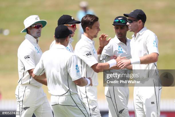 Trent Boult of New Zealand celebrates his 200th test wicket as he dismisses Kraigg Brathwaite of the West Indies during day four of the Second Test...