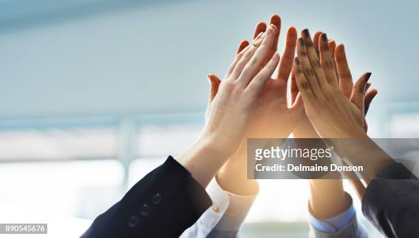teamwork! - high five business stock-fotos und bilder