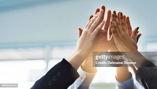 teamwork! - hi five stockfoto's en -beelden