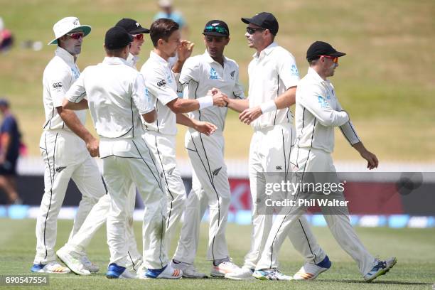 Trent Boult of New Zealand celebrates his 200th test wicket as he dismisses Kraigg Brathwaite of the West Indies during day four of the Second Test...