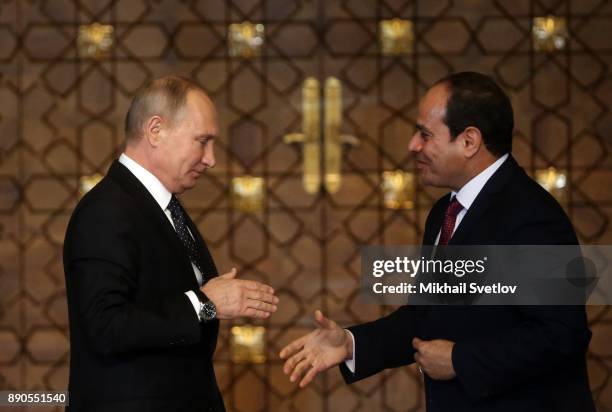 Russian President Vladimir Putin shakes hands with Egyptian President Abdel Fattah el-Sisi during their meeting on December 11, 2017 in Cairo, Egypt....