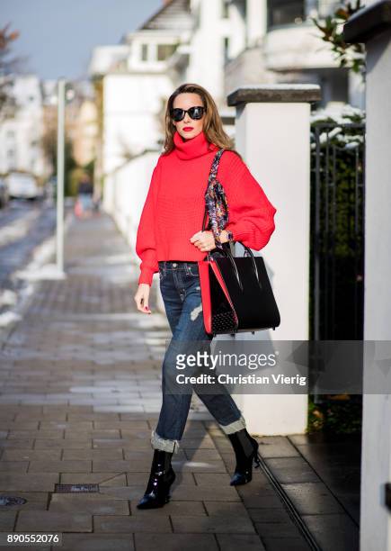 Alexandra Lapp wearing a cropped red turtleneck from H&M, Adriano Goldschmied Boyfriend denim from AG Jeans, Diormania sunglasses by Dior, Opyum 110...