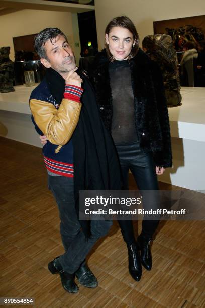 Andre Saraiva and Bamby Blight attend the Cesar Retrospective at Centre Pompidou on December 11, 2017 in Paris, France.