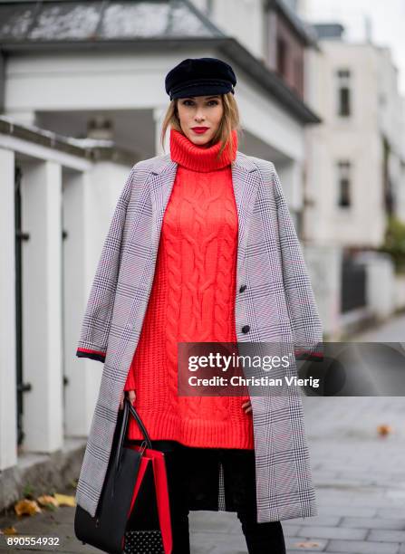 Alexandra Lapp wearing red turtleneck dress from H&M, overknee boots in black from Gianvito Rossi, checked coat from SET fashion, velvet baker boy...