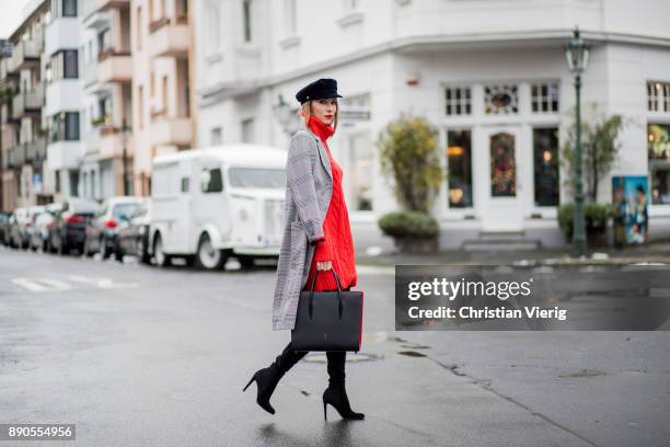 Alexandra Lapp wearing red turtleneck dress from H&M, overknee boots in black from Gianvito Rossi, checked coat from SET fashion, velvet baker boy...