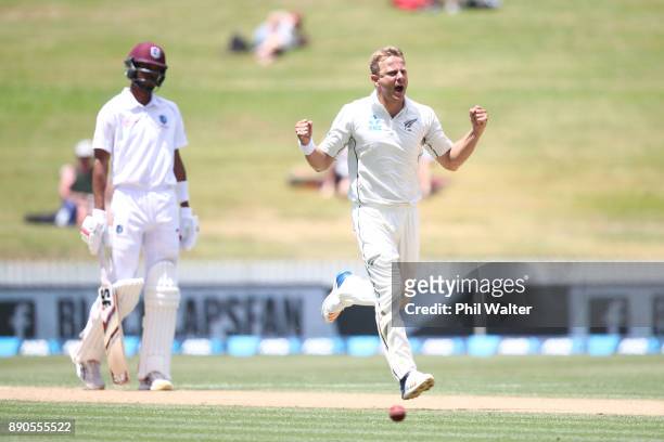 Neil Wagner of New Zealand celebrates his wicket of Shane Dowrich of the West Indies during day four of the Second Test Match between New Zealand and...