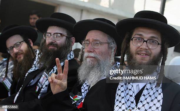 Members of the anti-Zionist religious Jewish community Naturei Karta attend a ceremony at the Palestinian parliament in Gaza City during their visit...