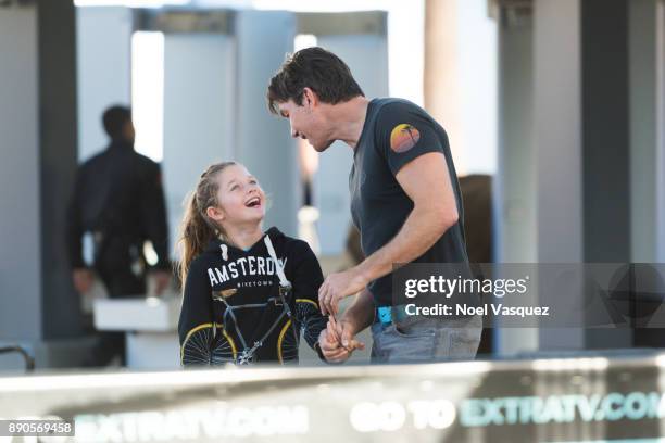 Jerry O'Connell and Charlie Tamara Tulip O'Connell visit "Extra" at Universal Studios Hollywood on December 11, 2017 in Universal City, California.