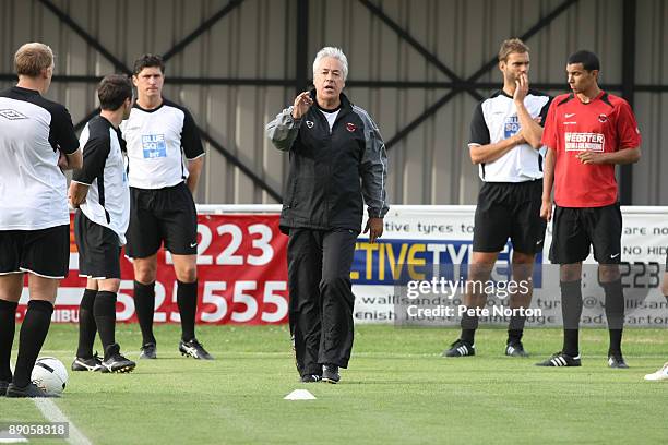 Histon coach John Beck coaching his players prior to the Pre-Season Friendly Match between Histon and Northampton Town at The Glassworld Stadium on...