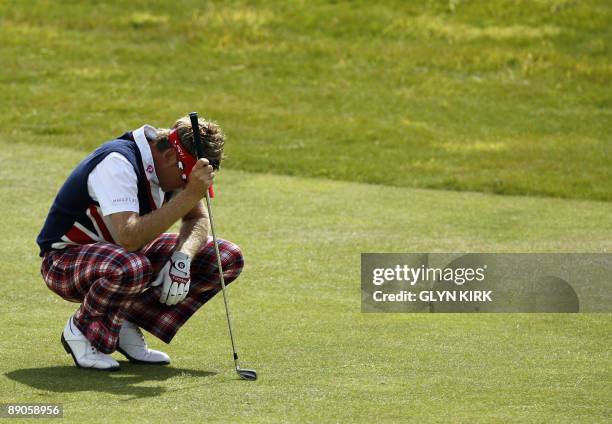 English golfer Ian Poulter is pictured on the 7th fairway on the first day of the 138th British Open Championship at Turnberry Golf Course in south...