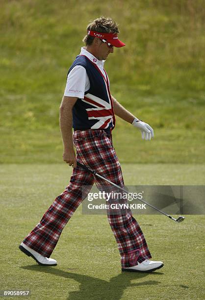 English golfer Ian Poulter walks on the 7th fairway on the first day of the 138th British Open Championship at Turnberry Golf Course in south west...