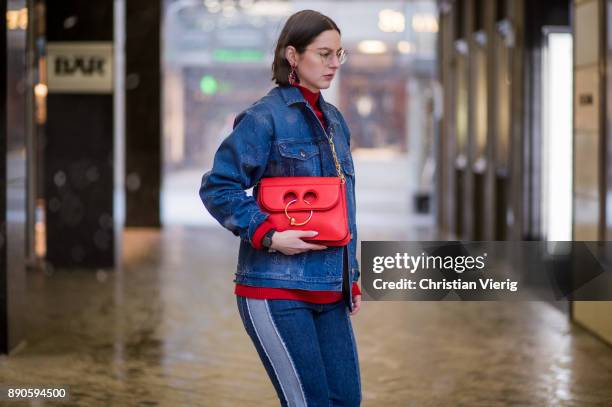 Maria Barteczko wearing oversized denim jacket with star details Stella McCartney, red ribbed turtleneck Victoria Beckham, glasses, used denim jeans...