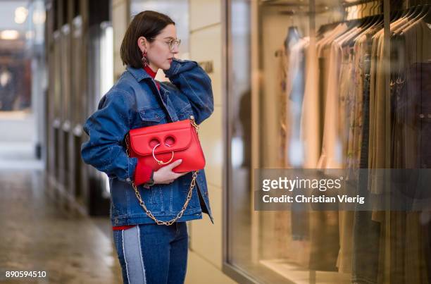 Maria Barteczko wearing oversized denim jacket with star details Stella McCartney, red ribbed turtleneck Victoria Beckham, glasses, used denim jeans...