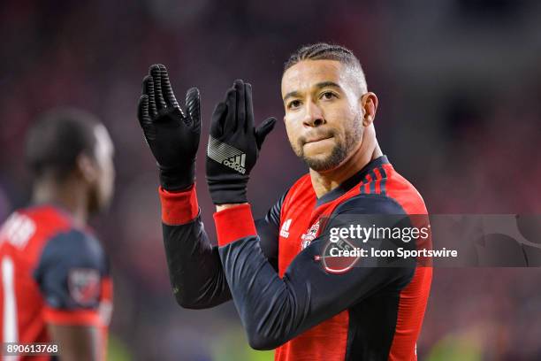 Toronto FC Defender Justin Morrow applauds and rally's the home fans in the dying minutes as the team was about to win the MLS Cup Final played...