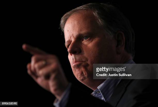 Democratic Senatorial candidate Doug Jones speaks during a get out the vote campaign rally on December 11, 2017 in Birmingham, Alabama. Jones is...