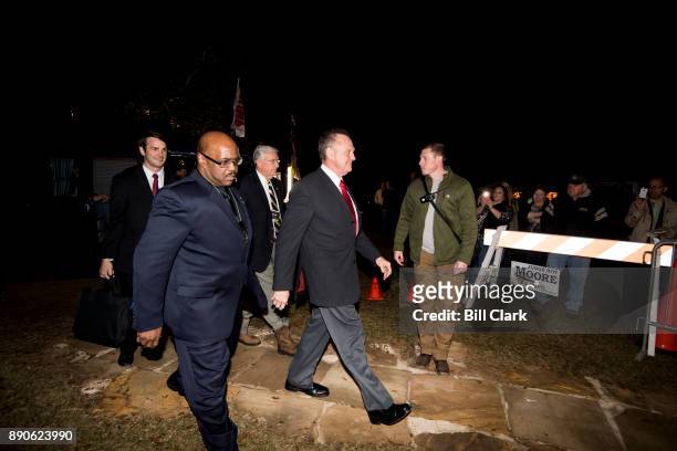 Republican Senate candidate Roy Moore arrives for his "Drain the Swamp" rally in Midland City, Ala., on Monday, Dec. 11, 2017.