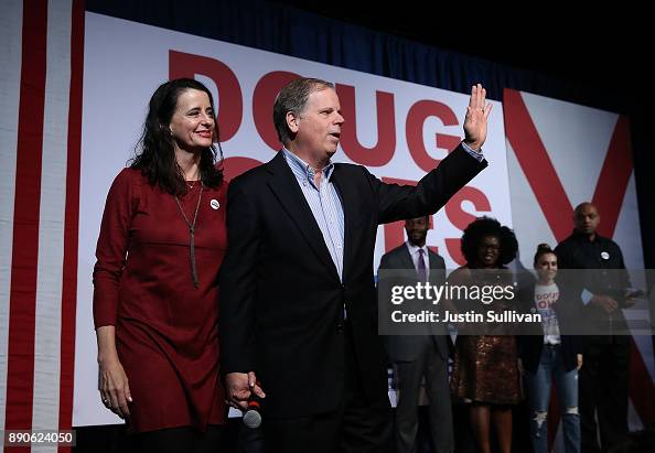 Democratic Senatorial candidate Doug Jones and his wife Louise Jones ...