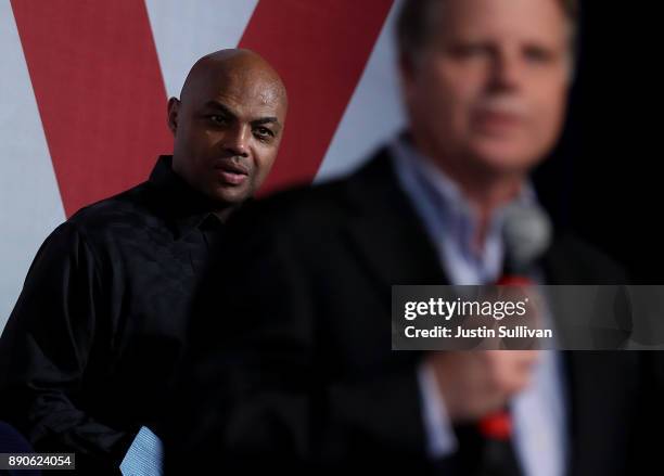 Hall of Famer Charles Barkley looks on as democratic Senatorial candidate Doug Jones speaks during a get out the vote campaign rally on December 11,...