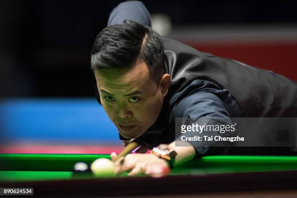 Marco Fu of Chinese Hong Kong plays a shot during his first round match against Duane Jones of Wales on day one of the 2017 Scottish Open at Emirates...