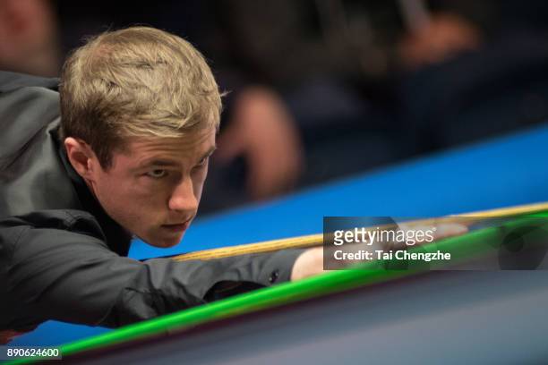 Jack Lisowski of England plays a shot during his first round match against John Higgins of Scotland on day one of the 2017 Scottish Open at Emirates...