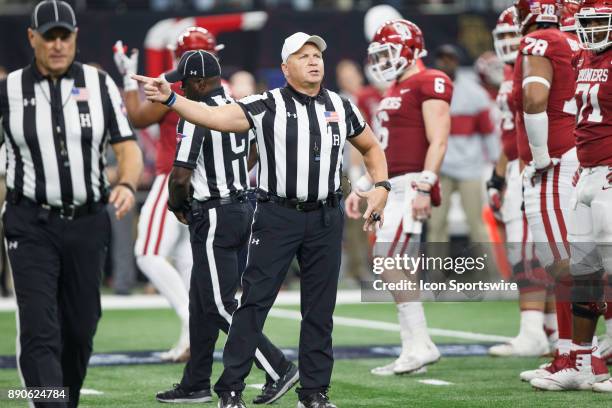 Big 12 referee Mike Defee makes a call during the Big 12 Championship game between the Oklahoma Sooners and the TCU Horned Frogs on December 2, 2017...